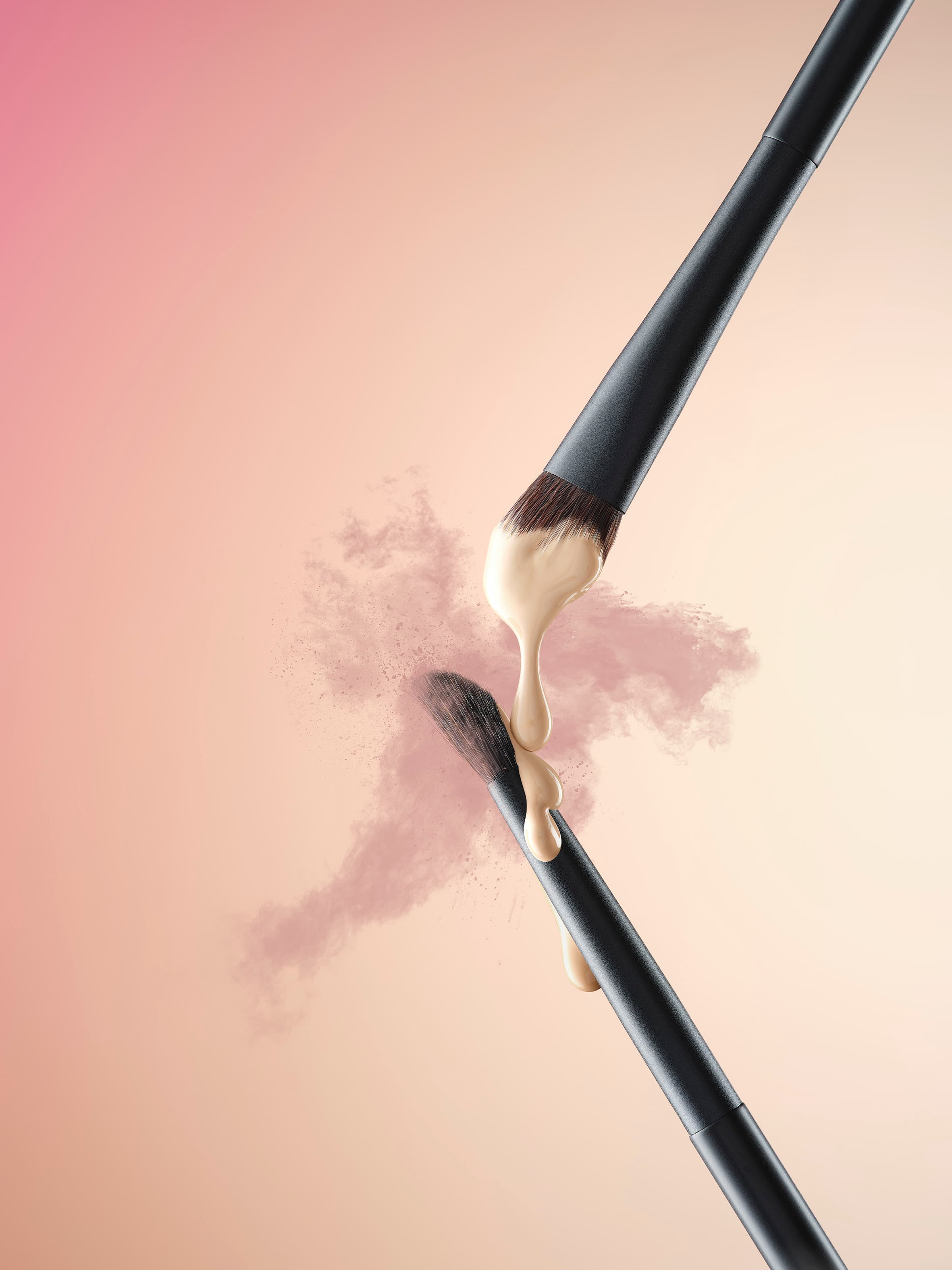 Lenoites Tapered Blender Brush 102 and Angled Blending Brush 103 with concealer and pink eyeshadow swirling around the bristles.